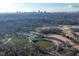 Baseball and tennis complex with Atlanta skyline in the background at 3820 Roswell Ne Rd # 705, Atlanta, GA 30342