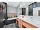 Modern bathroom features dual vanities, soaking tub, and slate tile floors for a spa-like feel at 3820 Roswell Ne Rd # 705, Atlanta, GA 30342