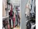 Organized walk-in closet with plenty of hanging space and shelving for optimal storage at 3820 Roswell Ne Rd # 705, Atlanta, GA 30342