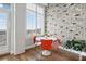Cozy dining area with hardwood floors, exposed brick, and bright natural light at 3820 Roswell Ne Rd # 705, Atlanta, GA 30342