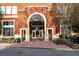 Inviting entrance of a brick building with a covered awning and stylish details at 3820 Roswell Ne Rd # 705, Atlanta, GA 30342