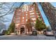 Beautiful brick condo building with well-maintained landscaping and convenient parking at 3820 Roswell Ne Rd # 705, Atlanta, GA 30342