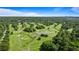 Aerial view of golf course and a pond, blending nature with recreation for a scenic view at 3820 Roswell Ne Rd # 705, Atlanta, GA 30342