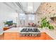 Modern kitchen boasts stainless steel appliances, white countertops, and abundant natural light at 3820 Roswell Ne Rd # 705, Atlanta, GA 30342