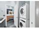 The laundry room features a stacked washer and dryer, adjacent to the bathroom at 3820 Roswell Ne Rd # 705, Atlanta, GA 30342