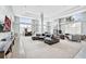 Spacious lounge with comfortable seating, modern decor, and a large column in the center at 3820 Roswell Ne Rd # 705, Atlanta, GA 30342