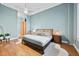 Cozy main bedroom with hardwood floors, a ceiling fan and ample natural light at 3820 Roswell Ne Rd # 705, Atlanta, GA 30342