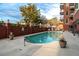 Outdoor pool area with clear blue water, surrounding patio, and comfortable lounge chairs at 3820 Roswell Ne Rd # 705, Atlanta, GA 30342
