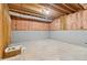 Exposed basement with concrete flooring and partially insulated walls at 7160 Royston Way, Cumming, GA 30028
