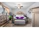 A well decorated bedroom featuring carpet, a tufted headboard, and neutral walls at 400 Toronto Cir, Hampton, GA 30228