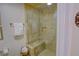 Modern bathroom features a tiled shower stall with a built-in bench for a luxurious bathing experience at 500 Bainbridge Dr, Atlanta, GA 30327