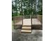 The new stained wooden deck is perfect for entertaining and grilling at 9866 Point View Dr, Jonesboro, GA 30238