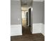 Hallway shot showing new flooring, fresh paint, and modern touches at 9866 Point View Dr, Jonesboro, GA 30238