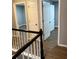 Hallway featuring fresh paint, new flooring, and modern doors at 9866 Point View Dr, Jonesboro, GA 30238