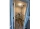The laundry room boasts modern flooring and ample room for shelving and storage at 9866 Point View Dr, Jonesboro, GA 30238