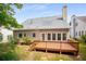 Exterior view of back of the house and the wooden deck, perfect for outdoor entertaining at 4481 Mccart Cv, Stone Mountain, GA 30083