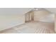 Attic bedroom featuring carpeted floors and architectural ceilings at 4481 Mccart Cv, Stone Mountain, GA 30083