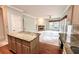 Open kitchen with stainless steel appliances, granite island, and easy access to breakfast nook and living room at 4481 Mccart Cv, Stone Mountain, GA 30083
