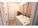 Laundry room featuring a washer, dryer, cabinets, and tile floors at 4481 Mccart Cv, Stone Mountain, GA 30083