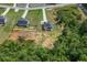 Aerial of home and lot featuring proximity to neighbors and partially wooded surroundings at 47 Whitley Ct, Dallas, GA 30157