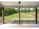 View of the backyard from the covered patio with a large grassy area at 47 Whitley Ct, Dallas, GA 30157