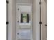 Bright bathroom with a soaking tub, and view to wooded backyard at 47 Whitley Ct, Dallas, GA 30157