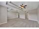 Spacious carpeted bedroom featuring a coffered ceiling and large windows at 47 Whitley Ct, Dallas, GA 30157