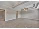 Spacious carpeted bedroom featuring a coffered ceiling and large windows at 47 Whitley Ct, Dallas, GA 30157