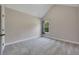 A bright bedroom featuring neutral walls, carpet floors and a window with natural light at 47 Whitley Ct, Dallas, GA 30157