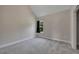 A bright bedroom featuring neutral walls, carpet floors and a window with natural light at 47 Whitley Ct, Dallas, GA 30157