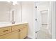 Bright bathroom featuring a light tan vanity and tile flooring, creating a clean and inviting space at 100 Nemoura Ct, Fairburn, GA 30213