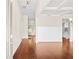 Welcoming entryway with hardwood floors leads into a spacious home with neutral colors and plenty of natural light at 100 Nemoura Ct, Fairburn, GA 30213