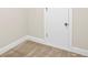 Room with neutral walls, carpeted floors and white trim with a white closet door at 100 Nemoura Ct, Fairburn, GA 30213