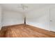 Bright bedroom with hardwood floors offers space and is illuminated with overhead lighting at 2015 Twelve Oaks Nw Cir, Kennesaw, GA 30144