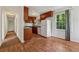 Efficient kitchen layout with laminate flooring, modern white appliances, and ample cabinet storage space at 2015 Twelve Oaks Nw Cir, Kennesaw, GA 30144