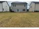 Large, level backyard provides ample space for outdoor activities and landscaping opportunities at 2105 Boxwood Se Cir, Conyers, GA 30094