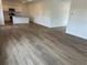 Spacious living room with modern wood flooring and an open layout at 2105 Boxwood Se Cir, Conyers, GA 30094