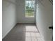 Efficient walk-in closet with built-in shelving maximizes storage in this home at 2105 Boxwood Se Cir, Conyers, GA 30094