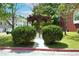Charming gazebo area on a sunny day in a well maintained common area at 4960 Villager Ln, Stone Mountain, GA 30083