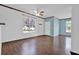 Bright living room with hardwood floors, ample windows, and neutral wall color at 7293 Bridlewood Ct, Jonesboro, GA 30236