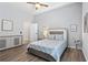Comfortable bedroom features hardwood floors and neutral wall art at 991 Metropolitan Sw Pkwy, Atlanta, GA 30310