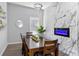 Dining room with marble accent wall and a table that seats eight at 991 Metropolitan Sw Pkwy, Atlanta, GA 30310