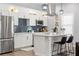 Contemporary kitchen with stainless steel appliances, white cabinets, and marble-look countertops at 991 Metropolitan Sw Pkwy, Atlanta, GA 30310