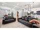 Spacious living room and eat-in kitchen featuring an island and stainless appliances at 991 Metropolitan Sw Pkwy, Atlanta, GA 30310