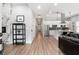 Bright, open-concept living space with modern finishes and eat-in kitchen featuring stainless appliances at 991 Metropolitan Sw Pkwy, Atlanta, GA 30310
