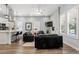Open concept living room and eat-in kitchen with stainless appliances and ample windows at 991 Metropolitan Sw Pkwy, Atlanta, GA 30310