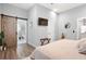 Bedroom with sliding barn door leading to the ensuite bathroom at 991 Metropolitan Sw Pkwy, Atlanta, GA 30310