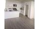 Bright kitchen showcases white cabinets, a center island with seating, and stainless steel appliances at 4011 Redan Rd # 9, Stone Mountain, GA 30083
