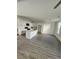 Bright kitchen showcases white cabinets, a center island with seating, and stainless steel appliances at 4011 Redan Rd # 9, Stone Mountain, GA 30083