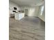 Bright kitchen showcases white cabinets, a center island with seating, and stainless steel appliances at 4011 Redan Rd # 9, Stone Mountain, GA 30083